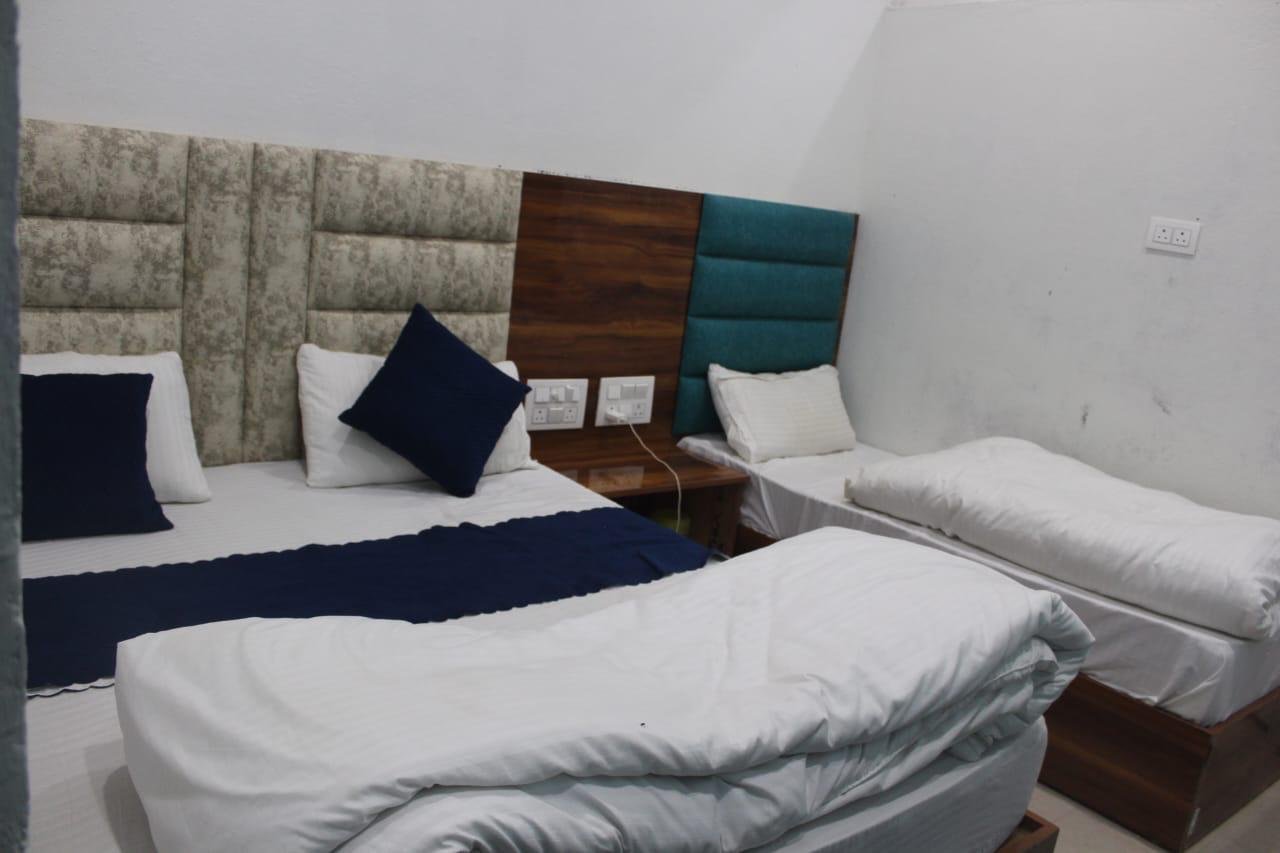 Double and single bed room
